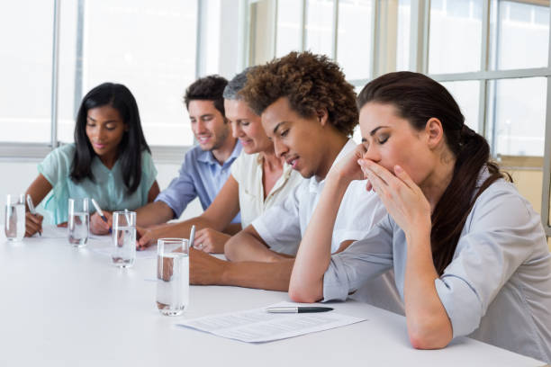 istock Business people yawning and being bored 832493272