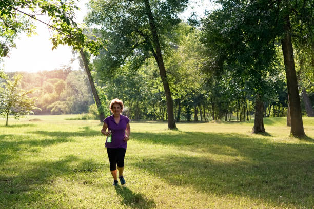 istock Senior woman exercising in the park 832494382
