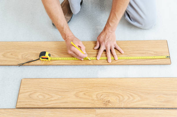 istock Installation of a laminate floorboard. 832497458