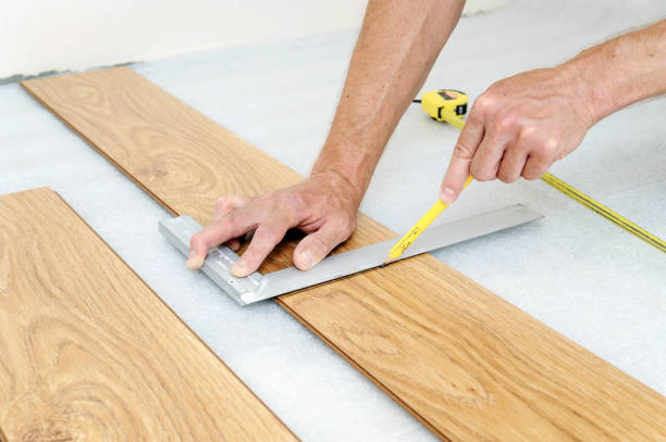istock Installation of a laminate floorboard. 832497710