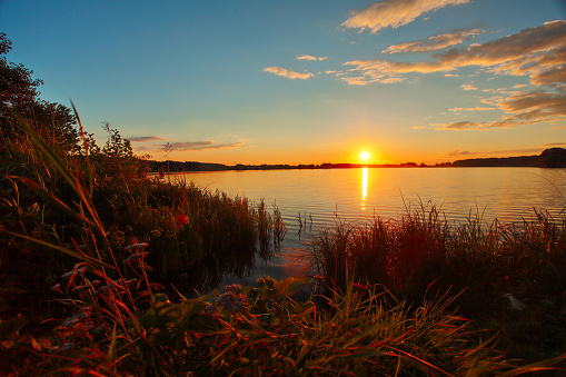 Beautiful autumn sunset over the lake in Russia