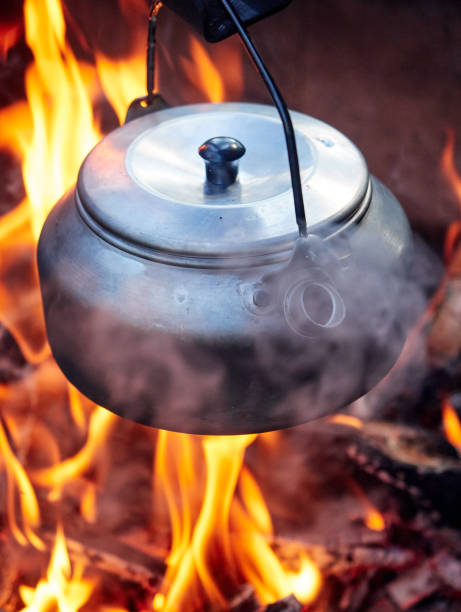 istock Metallic coffee pot in campfire heat 832512494
