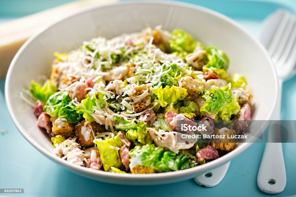 Chicken caesar salad with bacon, parmesan and herb croutons Salad Stock Photo