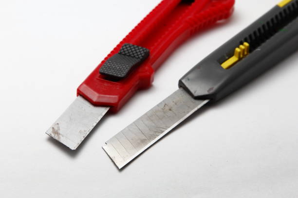istock New stationery knife on a white background 832523720