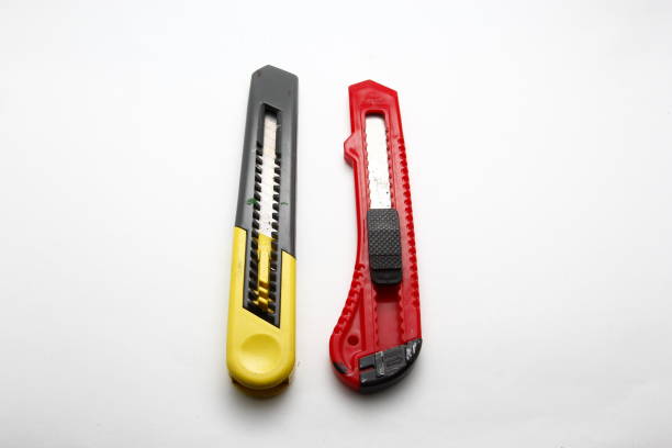 istock New stationery knife on a white background 832524214