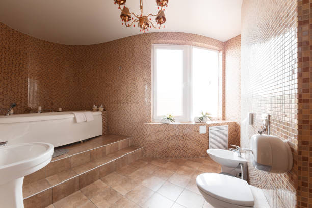 istock Modern luxury bathroom with bathtub and window. Interior design. 832525856