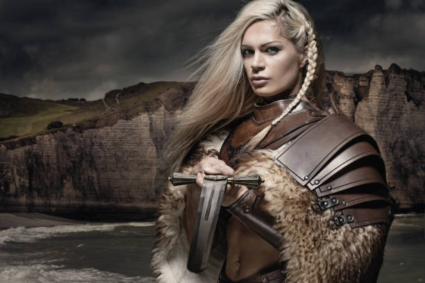 istock Beautiful Blonde Sword wielding viking warrior female 832529954