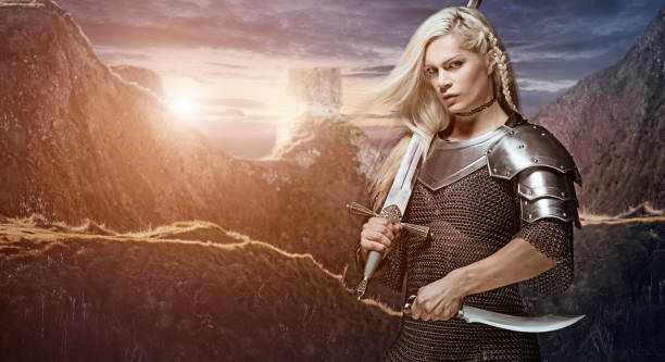 istock Beautiful Blonde Sword wielding viking warrior female 832530468