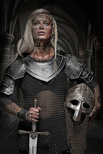 istock Beautiful Blonde Sword wielding viking warrior female 832533766