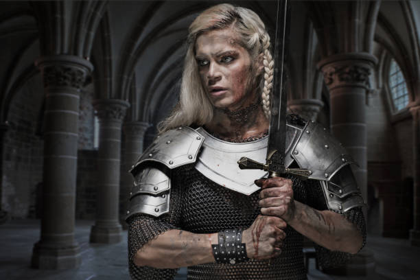 istock Beautiful Blonde Sword wielding viking warrior female 832533830