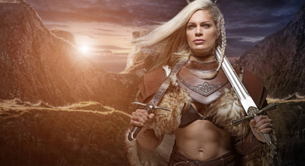 istock Beautiful Blonde Sword wielding viking warrior female 832533868
