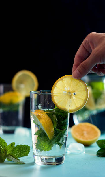 istock Cocktail mojito with ice. Dark background. Low key 832539296