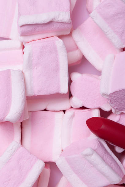 istock Red lipstick on a background of sweets 832551832