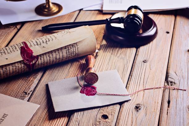 istock Notary public wax seal on old document. 832576118