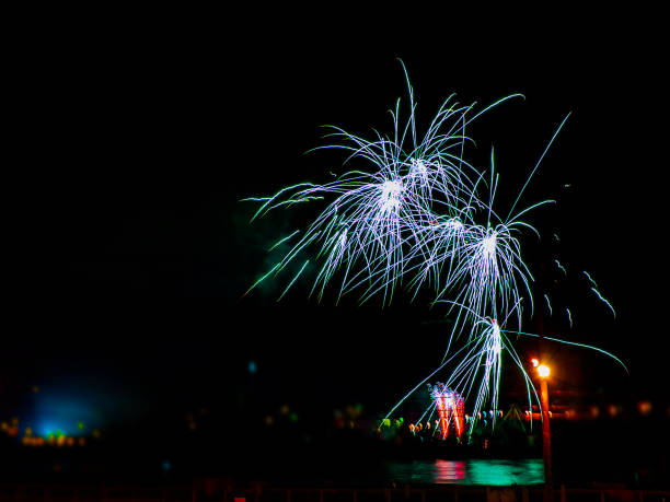istock Colorful fireworks with multiple bursts against dark sky 832586142