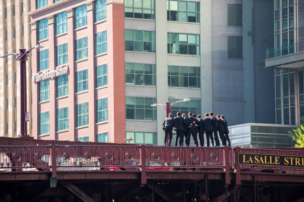 groomsmen brave standing on a bridge for a photo, downtown chicago - anti smoking imagens e fotografias de stock