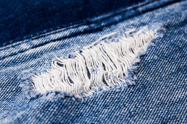 istock Ripped jeans with holes 832590128