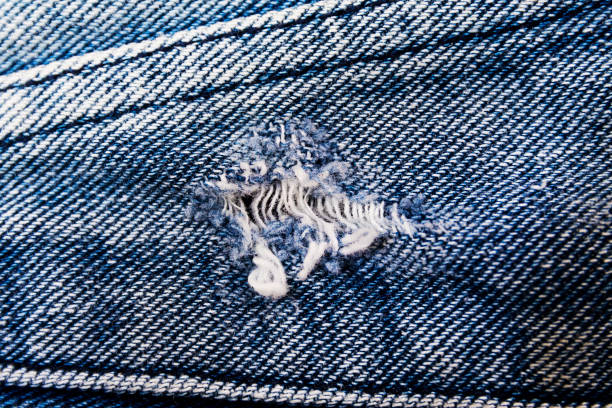 istock Ripped jeans with holes 832592664