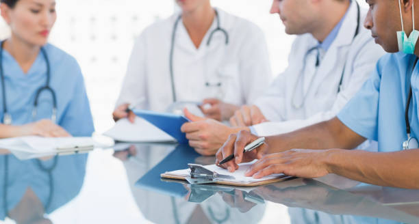 istock Doctors in a meeting at hospital 832597660