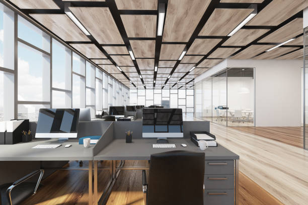 istock Wooden floor open space office, closeup 832605238