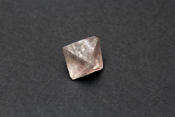 istock Mineral fluorite crystal in the background 832625602