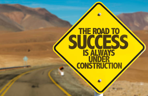 The Road to Success is Always Under Construction The Road to Success is Always Under Construction road sign road to success stock pictures, royalty-free photos & images