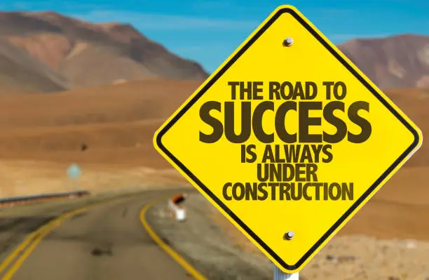 The Road to Success is Always Under Construction road sign