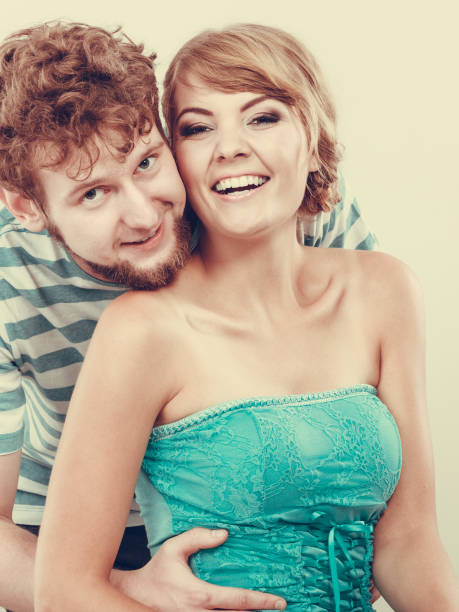 istock Cheerful young couple portrait 832640040