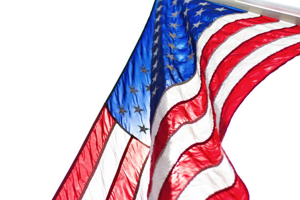 istock Sunlit US Flag Waving on White Background, Copy Space 832644102
