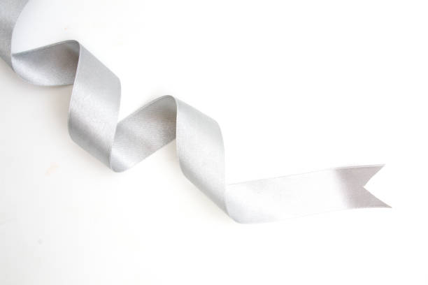 istock silver ribbon bow in bright silver white grey color isolated on white background 832655752