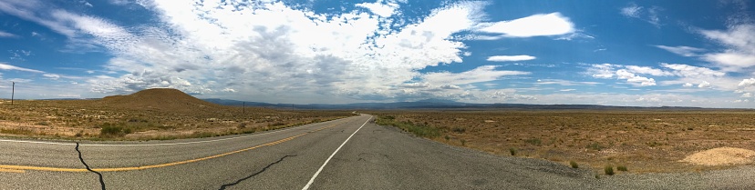 Desolate desert landscape and roadway