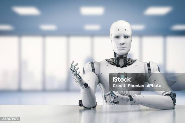 Robot Sitting Behind Table Stock Photo - Download Image Now - Robot, Cyborg, People