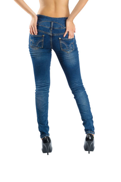 istock Woman blue jeans back view 832697774