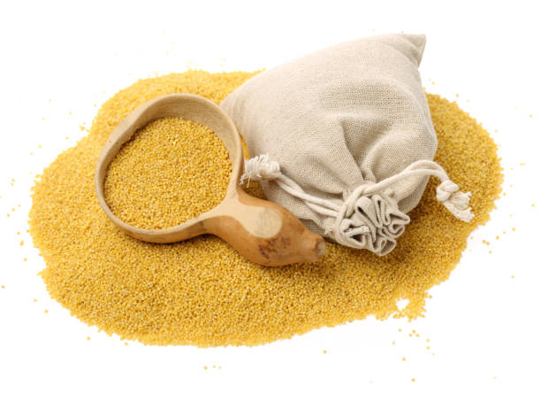 istock Raw uncooked millet in bowl and a bag 832731500