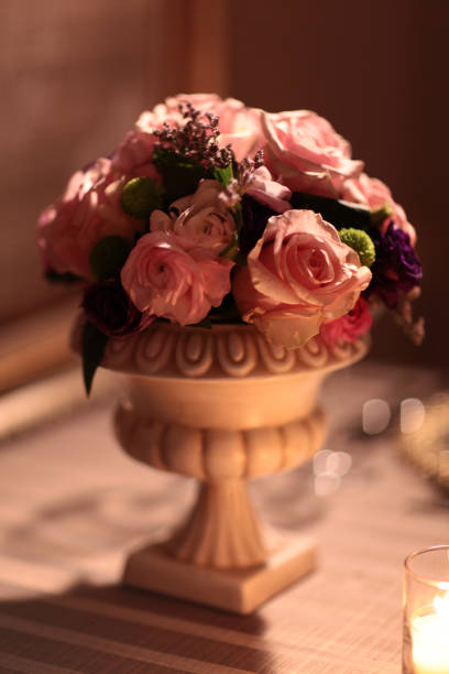 istock Bouquet of flowers in the vase on the table 832740708