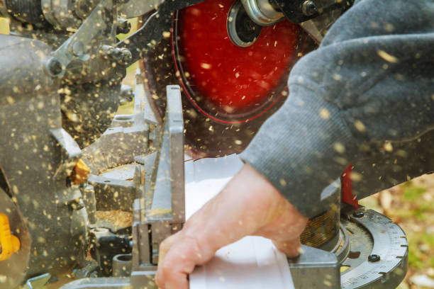 istock Man, worker sawing wood with a circular saw, machine for cutting. 832845406
