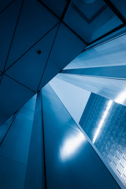 istock Low angle view of abstract building ceiling in blue tone 832860304