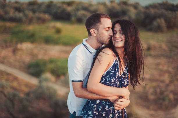 istock Couple in love for a walk in nature 832995956