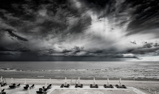 Approaching thunderstorm at sandy beach of the Baltic Sea