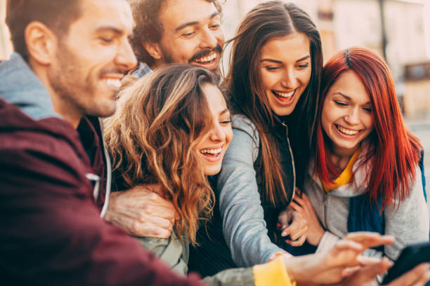 istock Friends texting in the city 833004506
