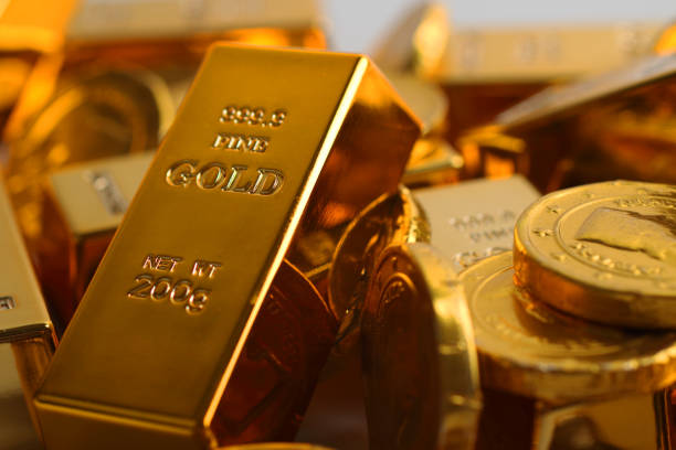 istock Gold coins with gold ingot 833028020