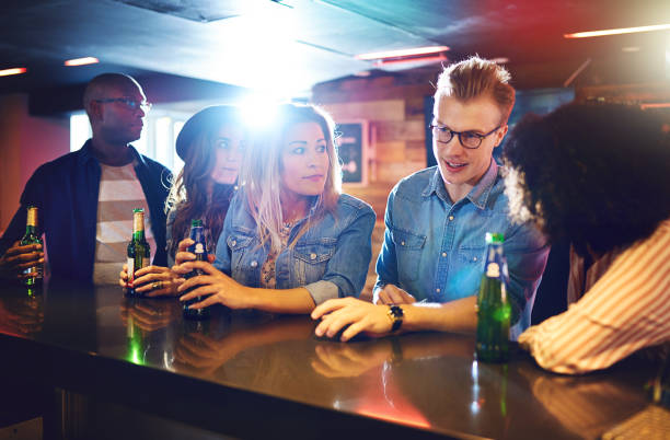 istock Friends having the drinks in the bar 833049870