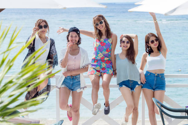 istock Young people having fun on the beach. 833062354
