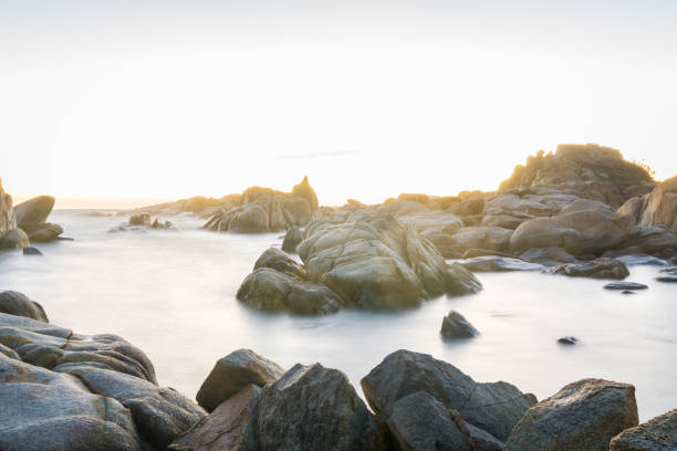 istock Long exposure of rock in beach 833083746