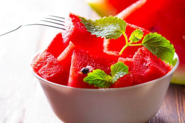 istock Watermelon fresh Wooden   background 833085304