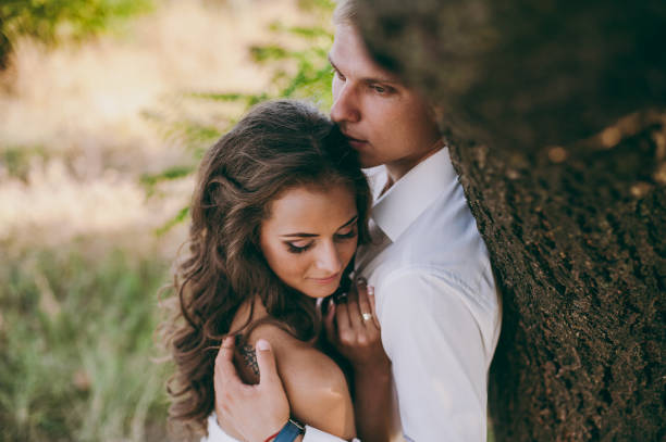 istock Beautiful wedding couple on a walk in the valley 833091736