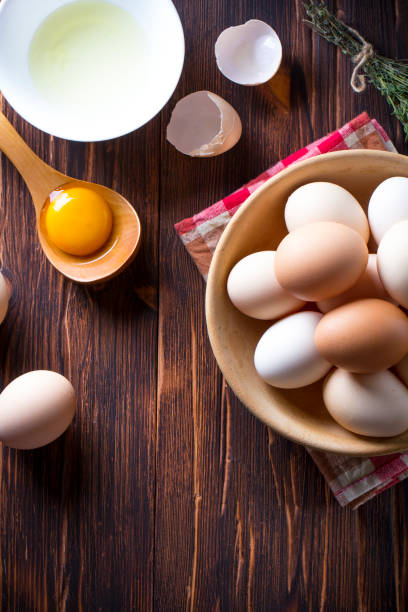 istock Eggs home made wooden plate Background vintage wood 833130652
