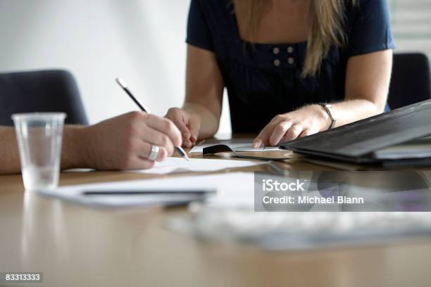 Taking Notes During Office Meeting Stock Photo - Download Image Now - 30-34 Years, Adults Only, Board Room