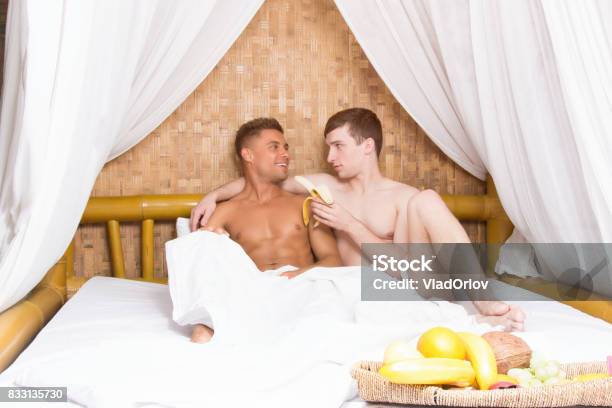 Romance And Love Holidays In The Tropics Happy Couple Attractive Guys Stock Photo - Download Image Now