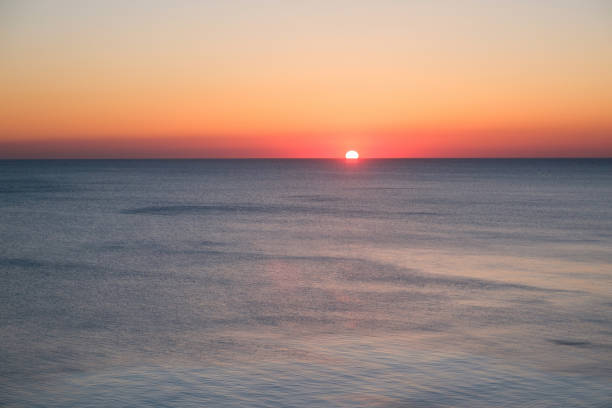 istock sunset over the sea, scenic seascape at evening 833149638